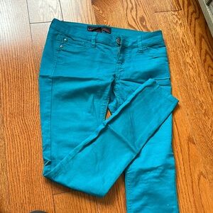 Turquoise skinny jeans